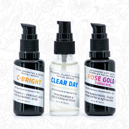 Three facial serum bottles labeled 'C-Bright', 'Clear Day', and 'Rose Gold+Bakuchiol' on a white background.